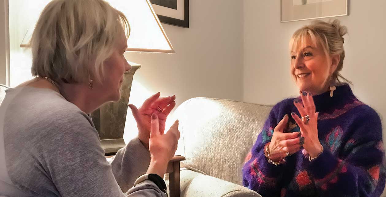 Karen, right, guiding a client through the EFT process. Photo courtesy Karen St. Clair