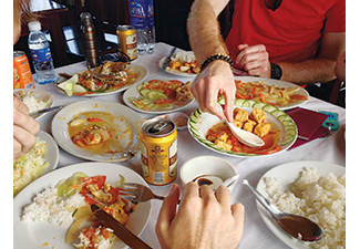 The first step is to “show up at the table” without watching TV, being on a device, or multitasking. Photo courtesy Bill Kasman via Pixabay