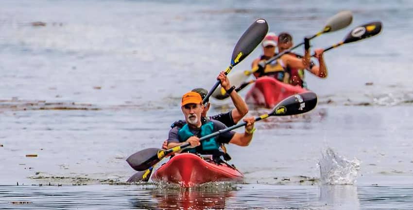 Kayakers in the Maine Summer Adventure Race charge across the bay. Photo courtesy Strong Machine Adventure Racing